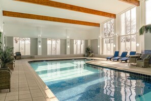 Indoor pool, open 8:00 AM to 6:00 PM, pool loungers
