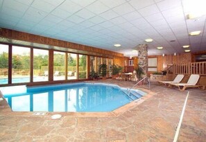 Indoor pool, open 9:00 AM to 10:00 PM, pool loungers - Howard Johnson by Wyndham Merrillville (Merrillville)