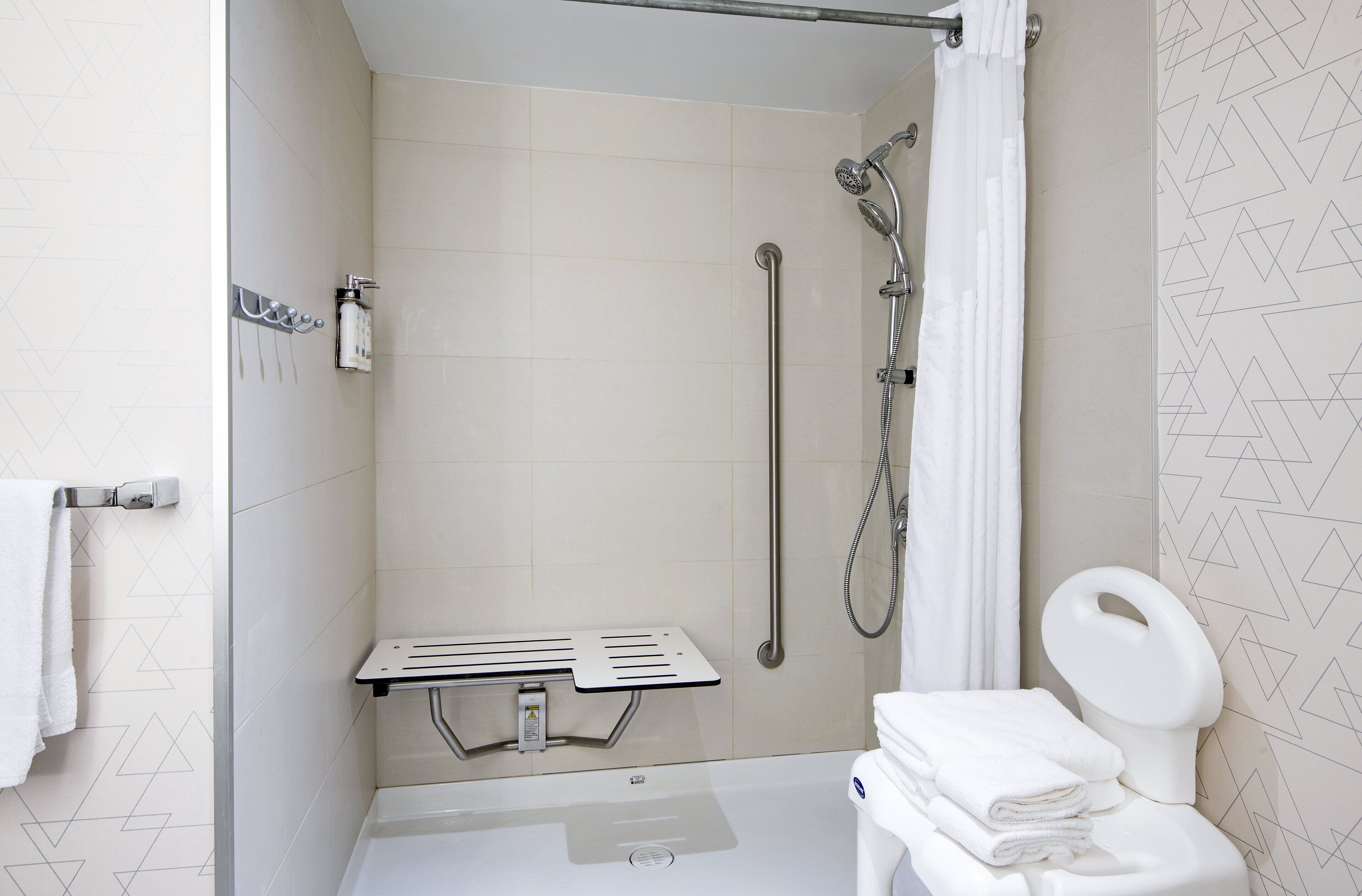 combined shower/bathtub, free toiletries, hair dryer, towels