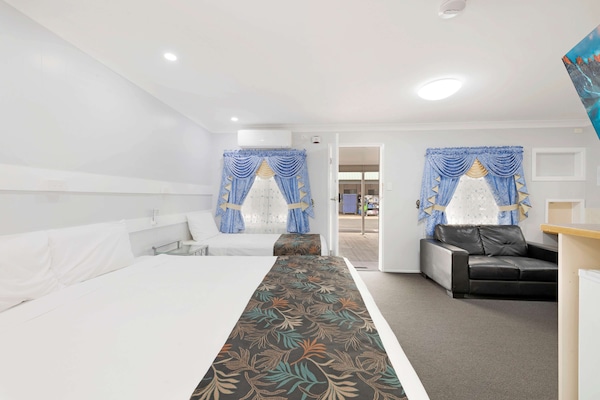 Executive Room, Multiple Beds, Non Smoking | Premium bedding, minibar, individually decorated, individually furnished