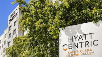 A building with a sign that reads 'HYATT CENTRIC SANTA CLARA SILICON VALLEY'.