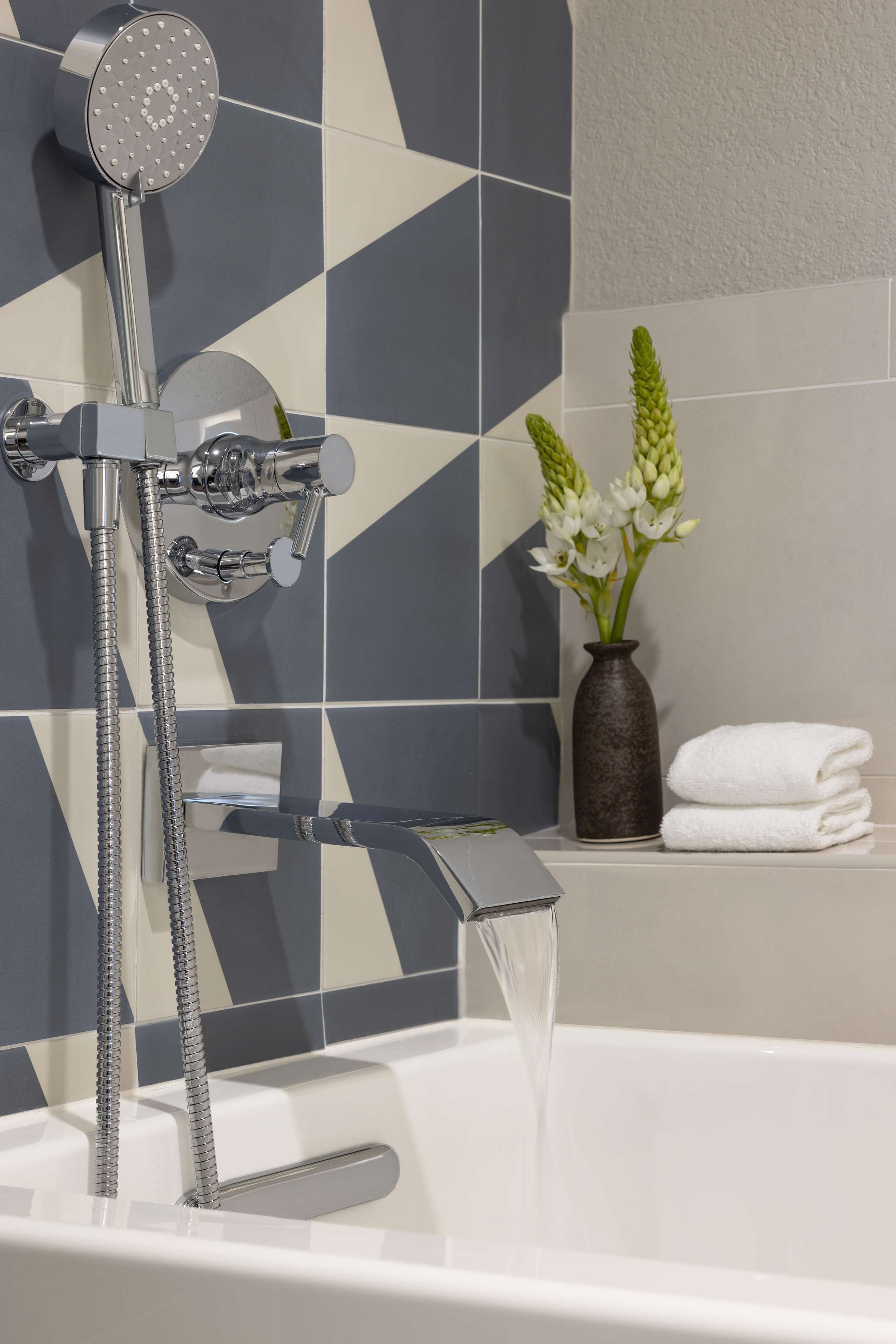 premium suite (king) | bathroom | shower, rainfall showerhead, designer toiletries, hair dryer