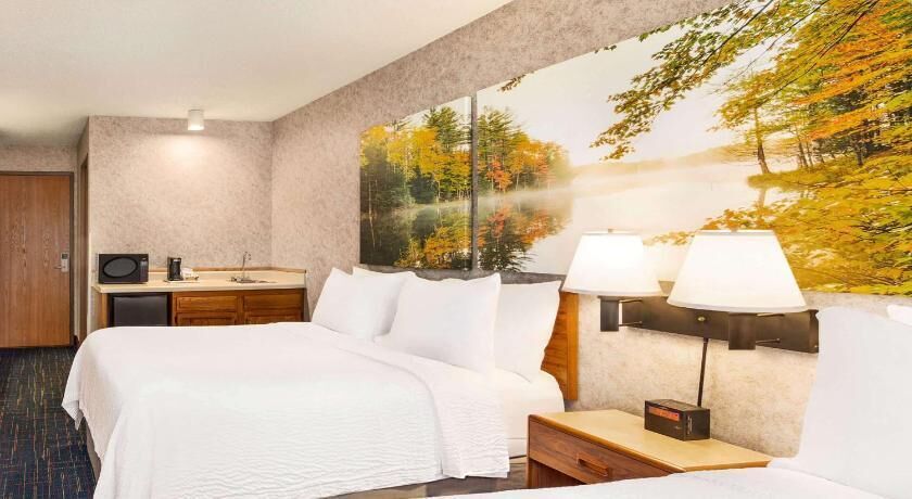 Premium bedding, desk, laptop workspace, iron/ironing board