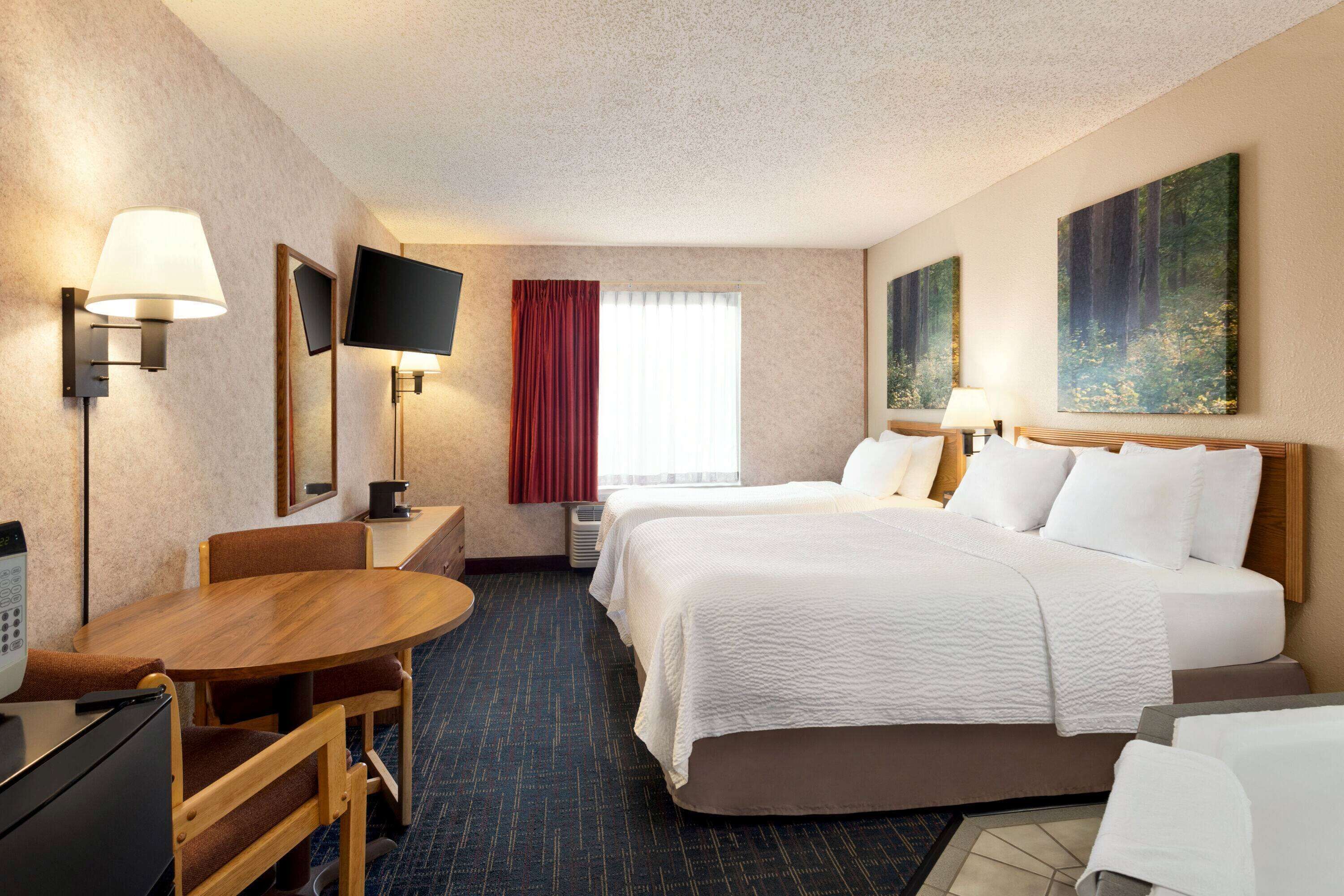 suite, 1 queen bed | premium bedding, desk, laptop workspace, iron/ironing board