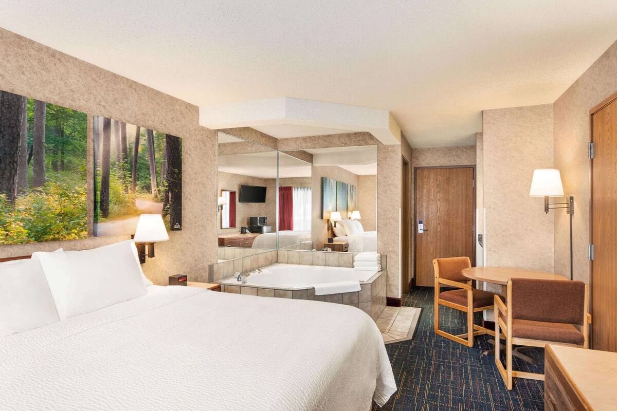 premium bedding, desk, laptop workspace, iron/ironing board