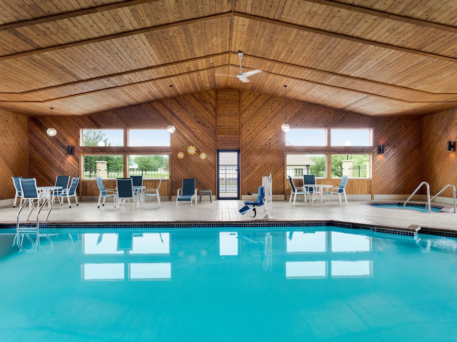 Indoor pool, open 6:00 AM to midnight, pool loungers