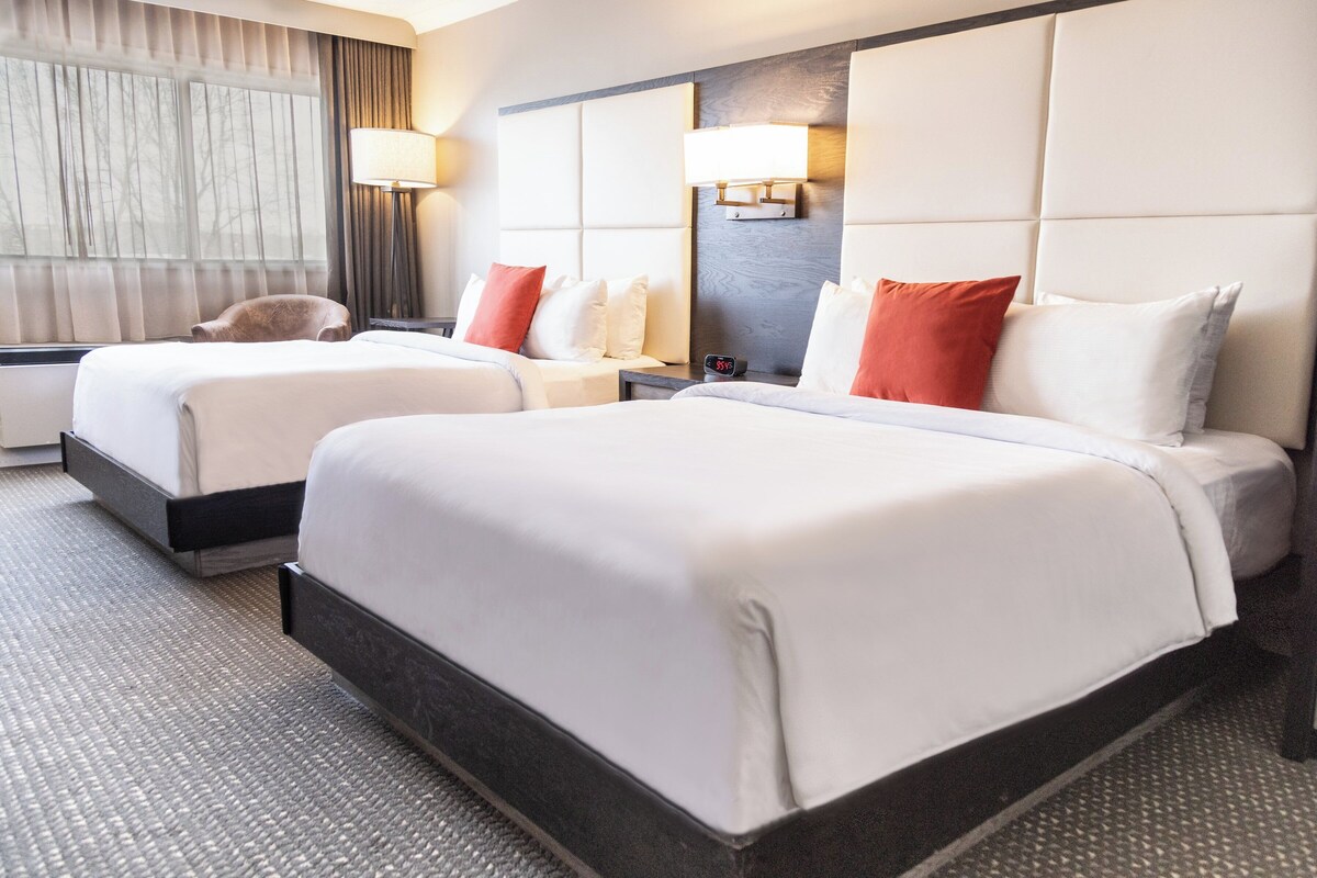 Luxe beddengoed, pillowtop-bedden, een kluis op de kamer, een bureau