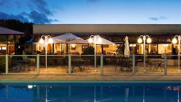 Seasonal outdoor pool, open 10:00 AM to 8 PM, pool umbrellas