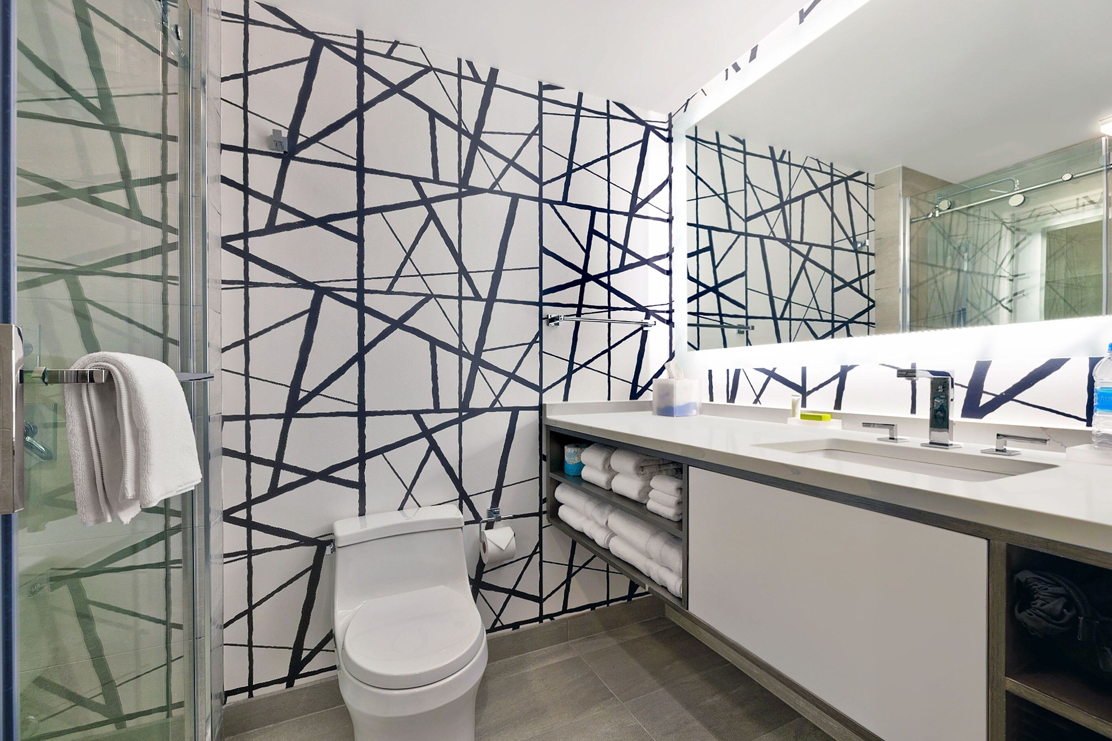 shower, free toiletries, hair dryer, towels