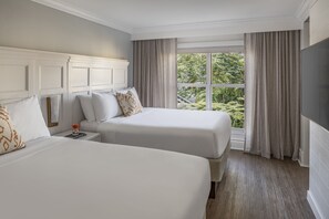 Hypo-allergenic bedding, down comforters, pillowtop beds, in-room safe