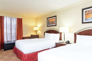 Room, 2 Double Beds | In-room safe, desk, laptop workspace, blackout drapes