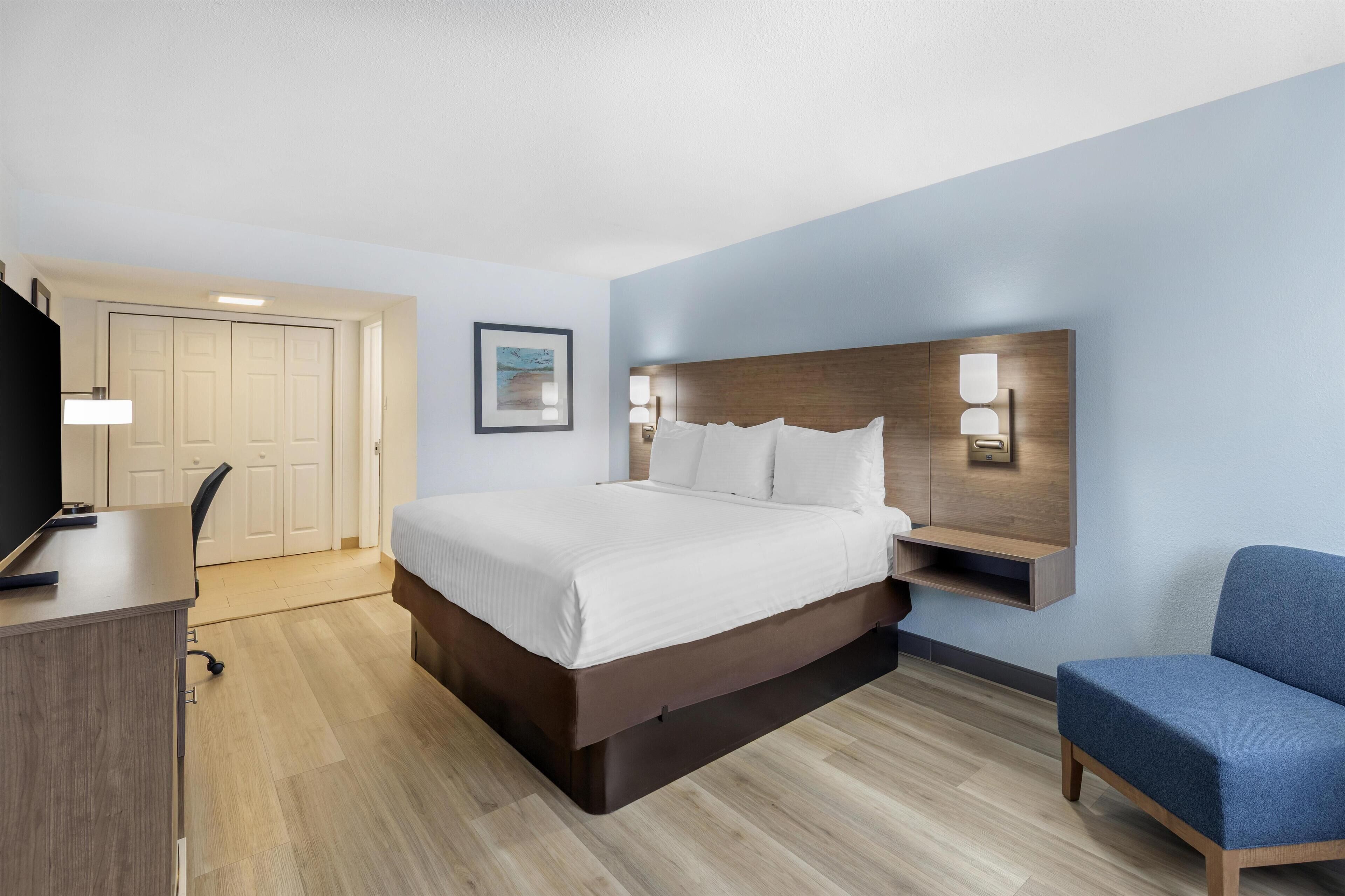 Desk, laptop workspace, blackout curtains, iron/ironing board