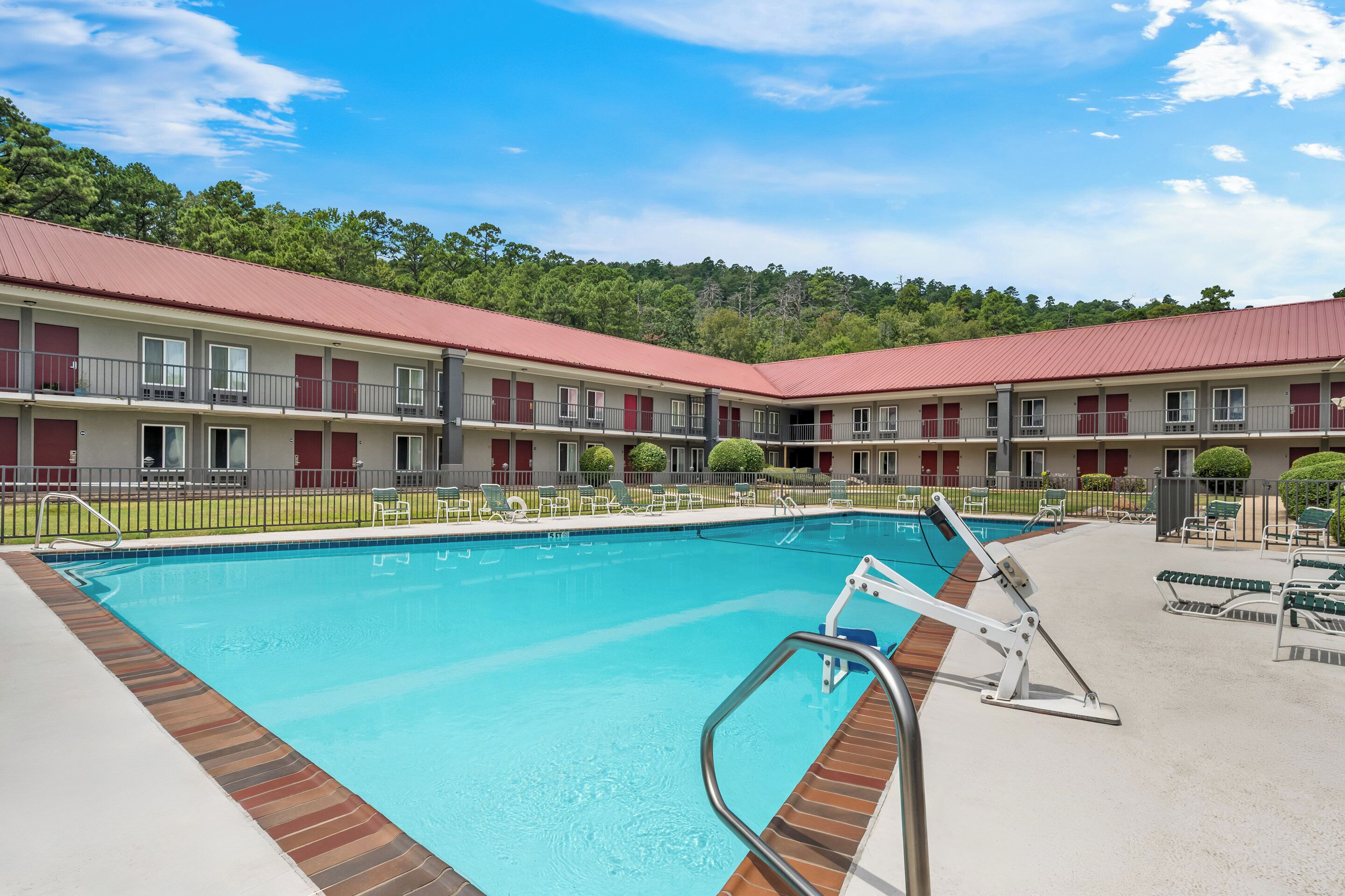 Seasonal outdoor pool, open 9:00 AM to 9:00 PM, pool umbrellas