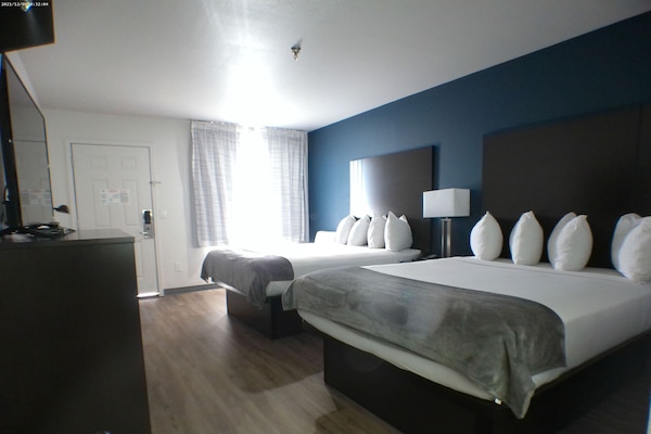 Desk, laptop workspace, blackout curtains, free WiFi