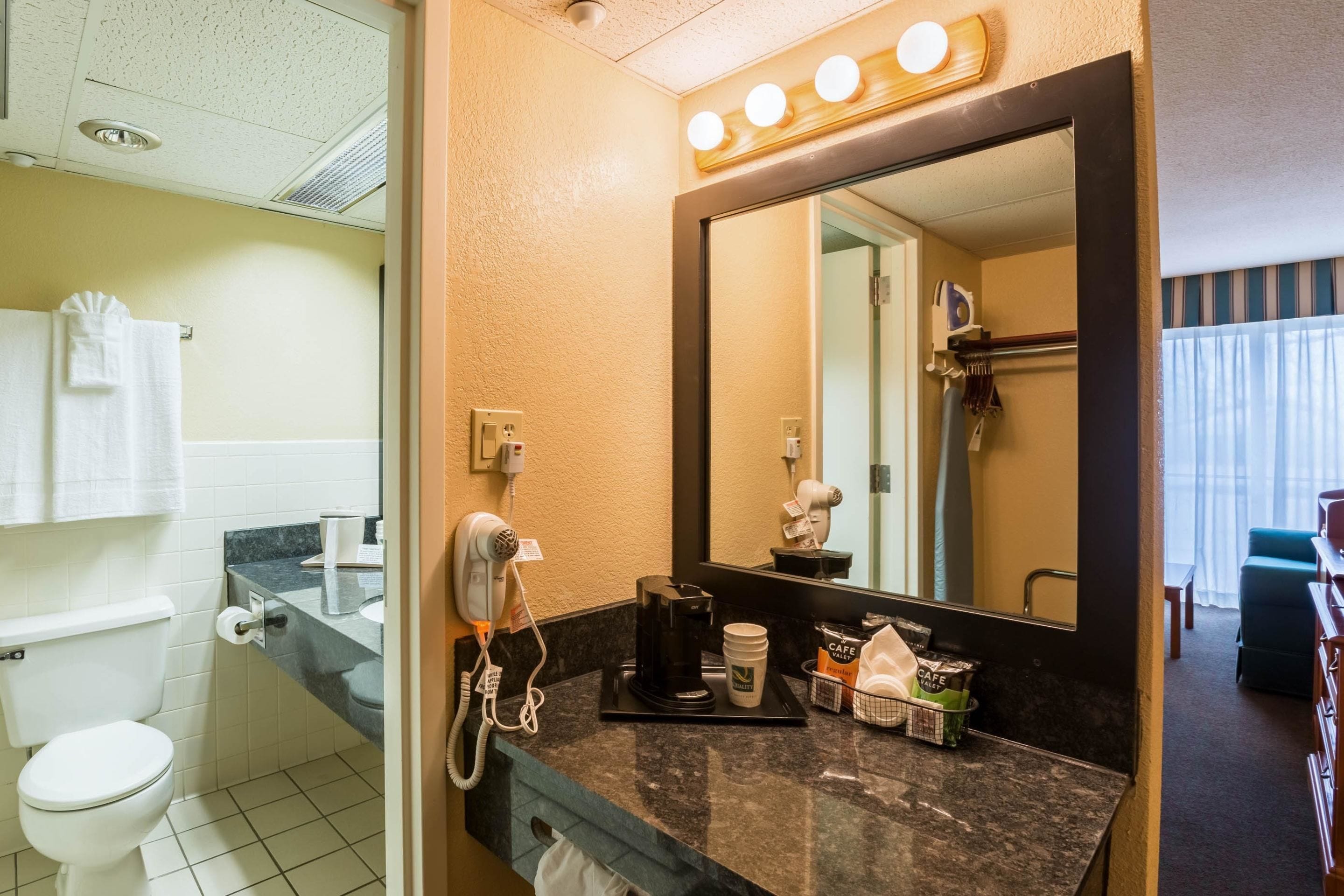 desk, blackout curtains, soundproofing, iron/ironing board