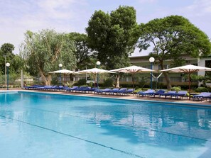 Outdoor pool, pool umbrellas, sun loungers