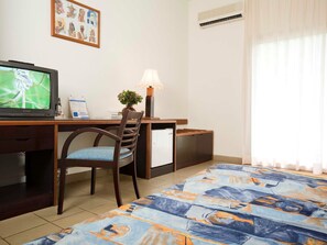 Habitació estàndard | Llençols de cotó egipci, roba de llit d'alta qualitat i cobrellits 