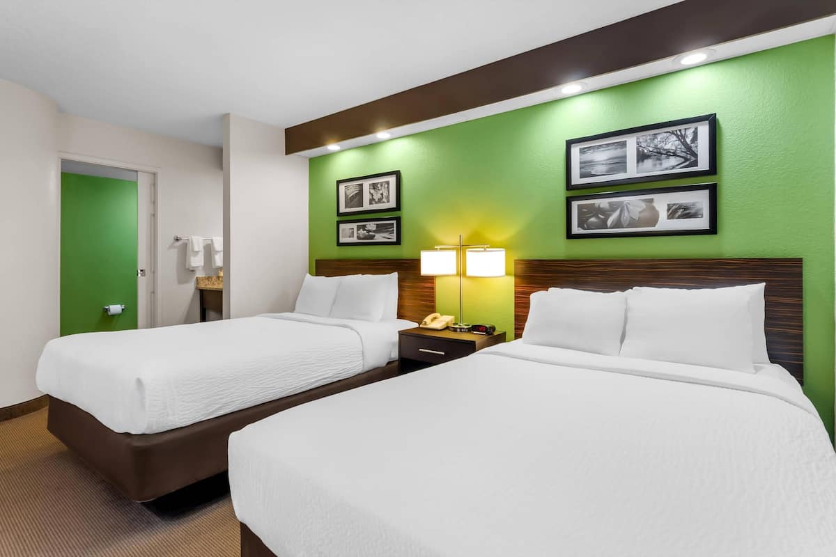 Standard Room, 2 Double Beds, Non Smoking | In-room safe, desk, iron/ironing board, free cribs/infant beds