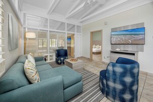 Suite, Multiple Beds, Non Smoking, Jetted Tub | Living area | 37-inch LCD TV with cable channels, TV