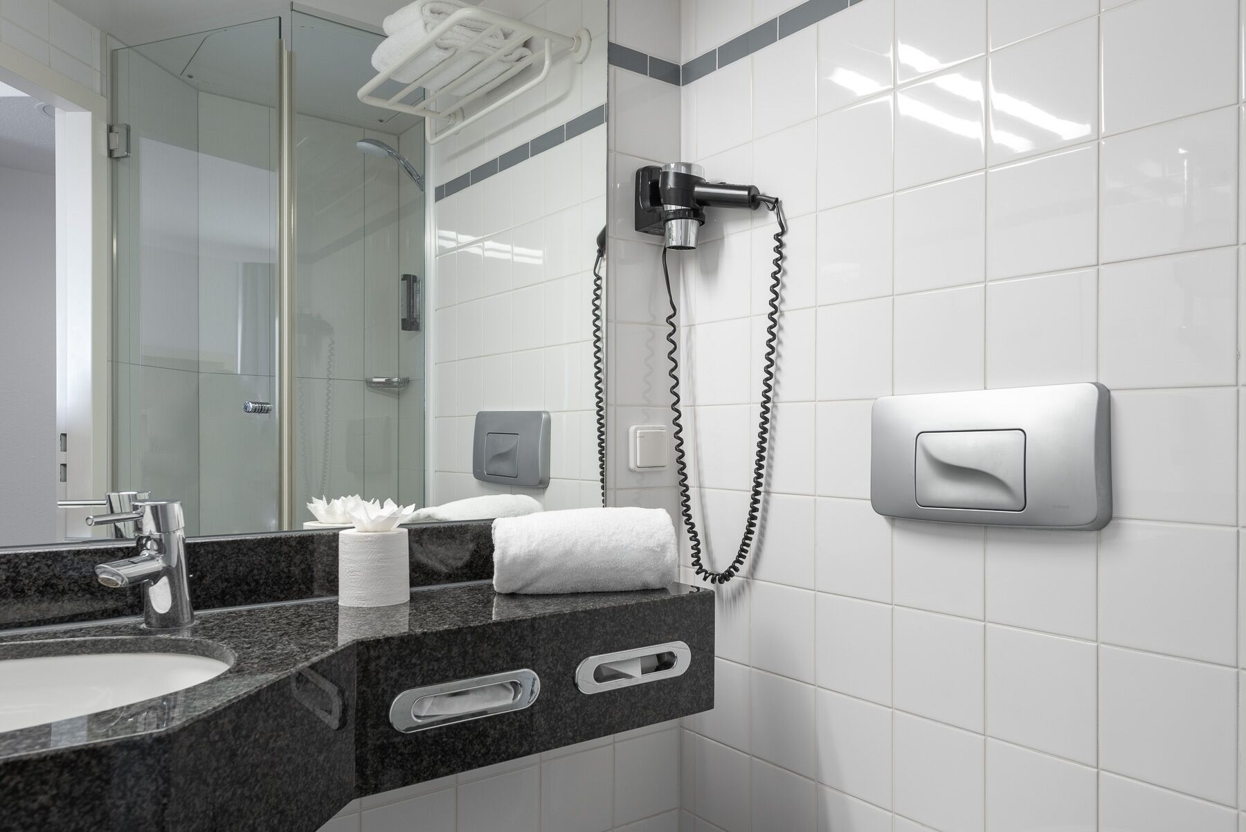 shower, free toiletries, hair dryer, towels