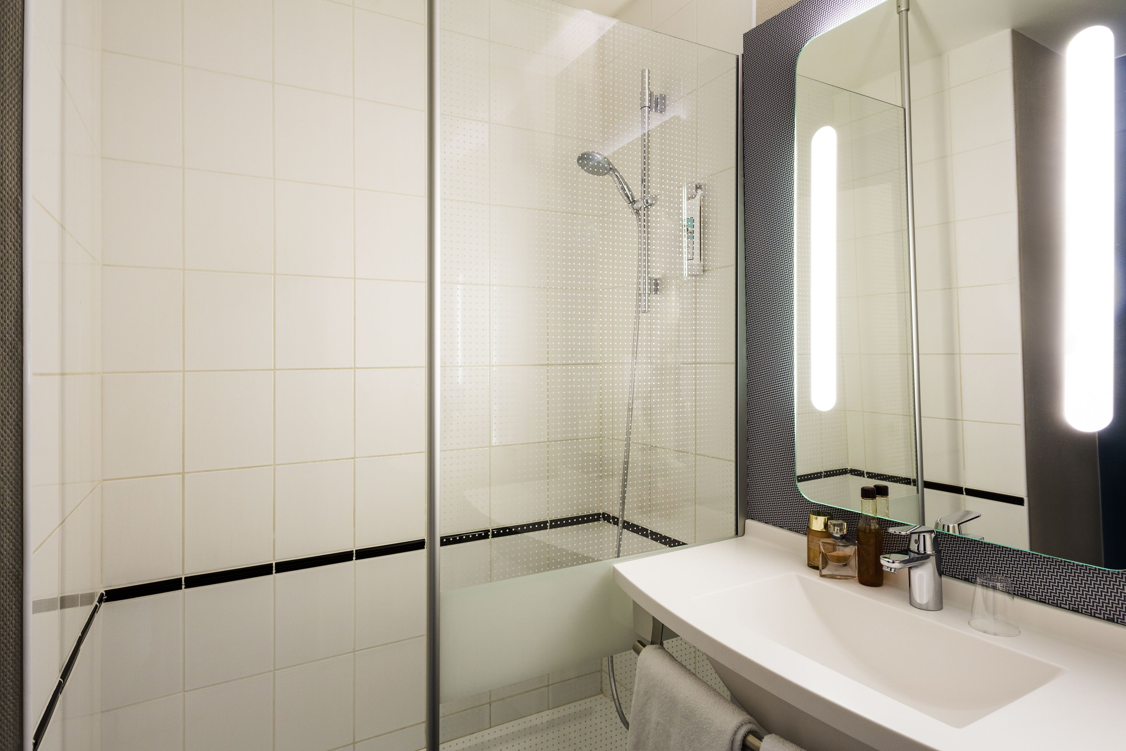 shower, eco-friendly toiletries, hair dryer, towels