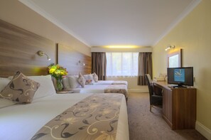 Habitación familiar | Escritorio, cortinas blackout, cunas gratuitas y wifi gratis