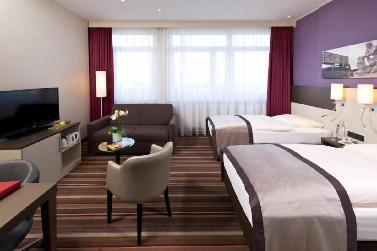 Premium bedding, in-room safe, desk, soundproofing