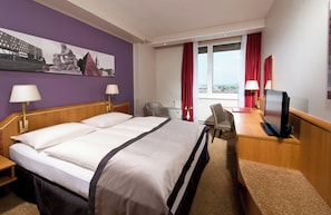 Premium bedding, in-room safe, desk, soundproofing