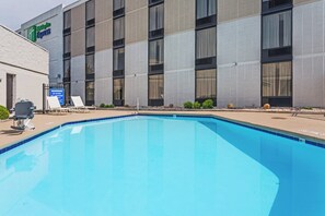 A pool area with a sign indicating no diving and no lifeguard. - Holiday Inn Express Wilkesboro by IHG (North Wilkesboro)