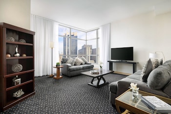 In-room safe, desk, laptop workspace, blackout drapes at Millennium Hotel Broadway Times Square