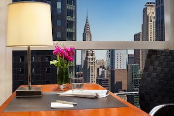 Hotel room view looking out at Millennium Hotel Broadway Times Square