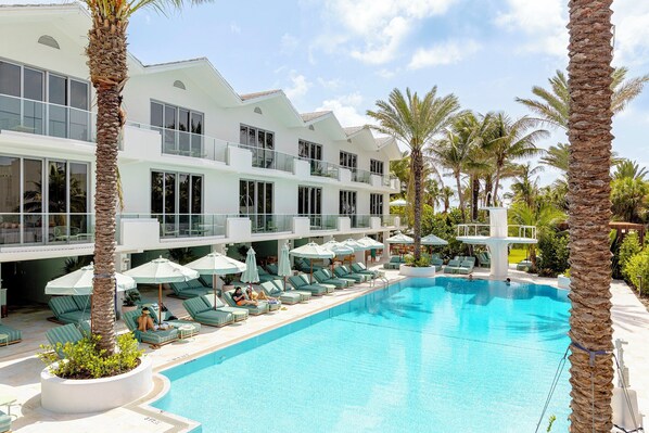 Outdoor pool, open 7:00 AM to 8:00 PM, pool cabanas (surcharge)