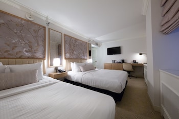Two Queen Beds Room | Premium bedding, in-room safe, desk, laptop workspace at Warwick Allerton - Chicago