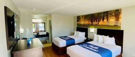 Desk, laptop workspace, blackout drapes, iron/ironing board