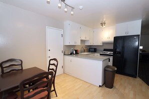 Suite, 2 Queen Beds, Non Smoking, Kitchen (Separate Living Room) | 1 bedroom, desk, laptop workspace, iron/ironing board