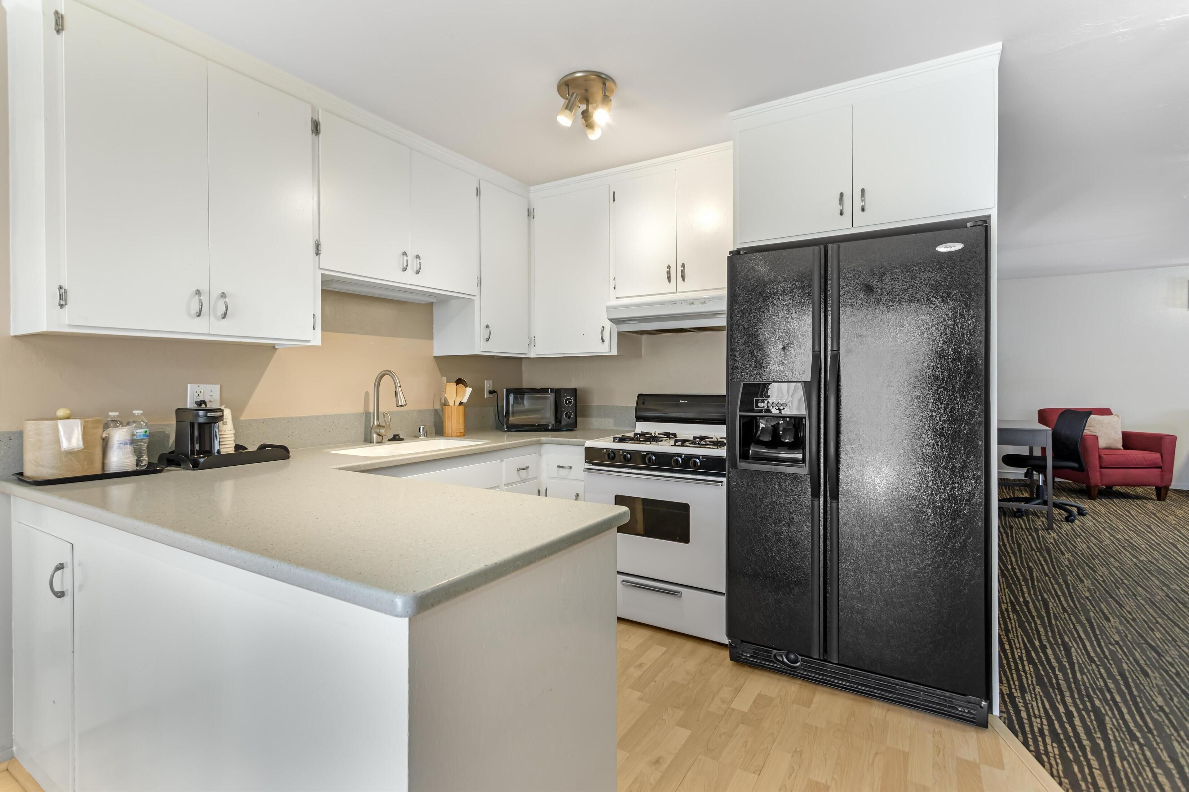 suite, 2 queen beds, non smoking, kitchen (separate living room) | desk, laptop workspace, iron/ironing board, wifi