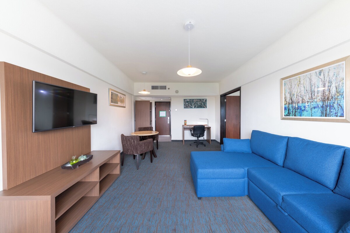 Suite, 1 Bedroom | In-room safe, desk, blackout drapes, iron/ironing board