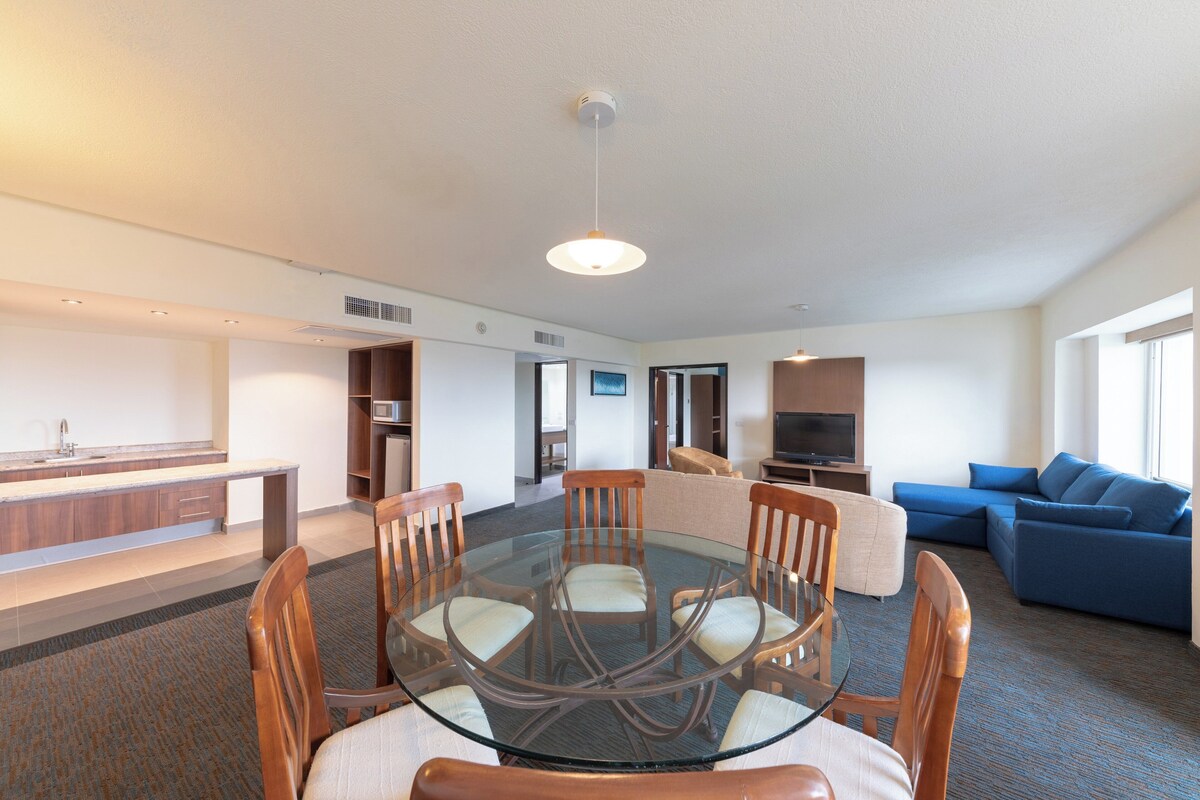 Suite, 1 Bedroom, City View | In-room safe, desk, blackout drapes, iron/ironing board