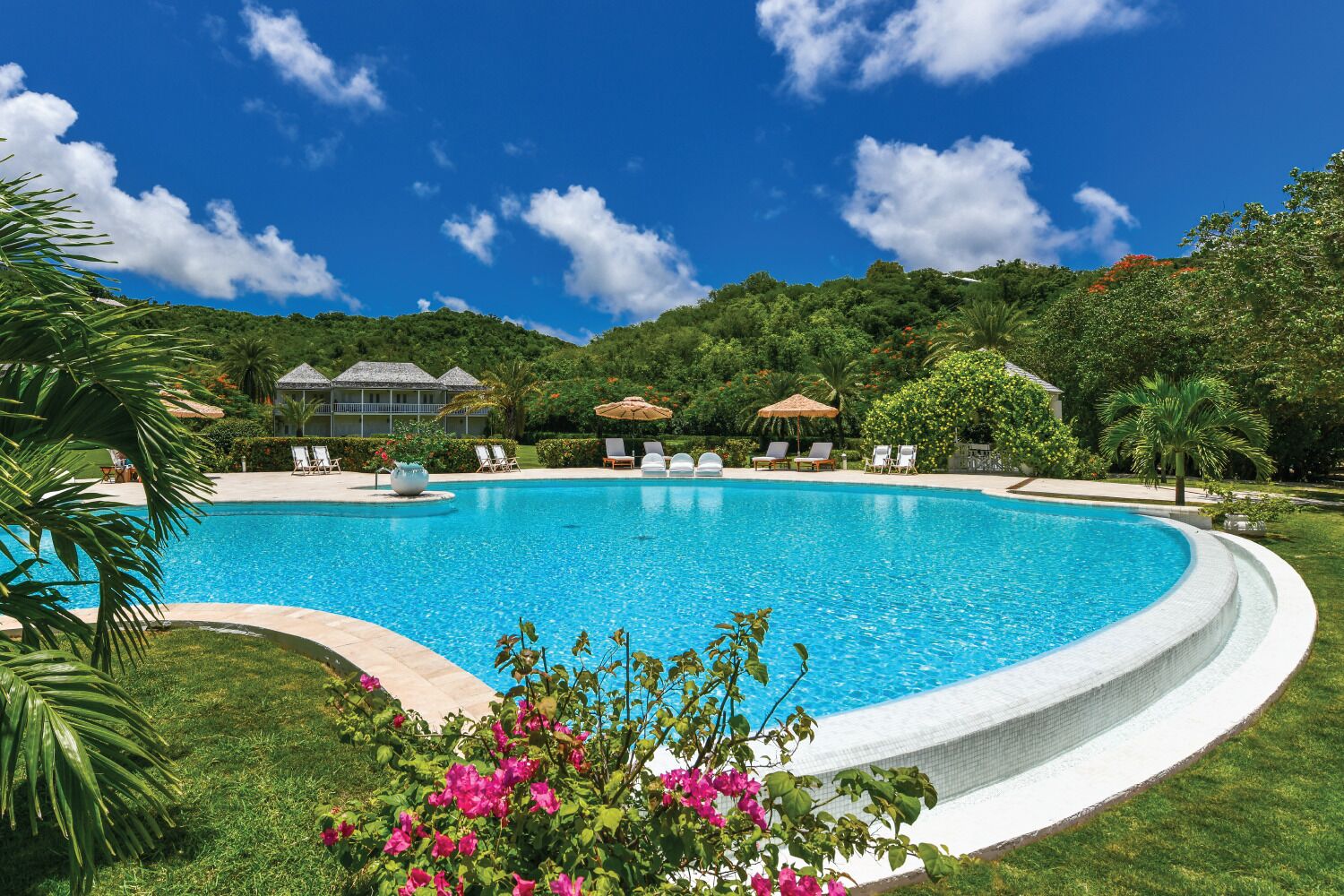 outdoor pool, pool umbrellas, pool loungers