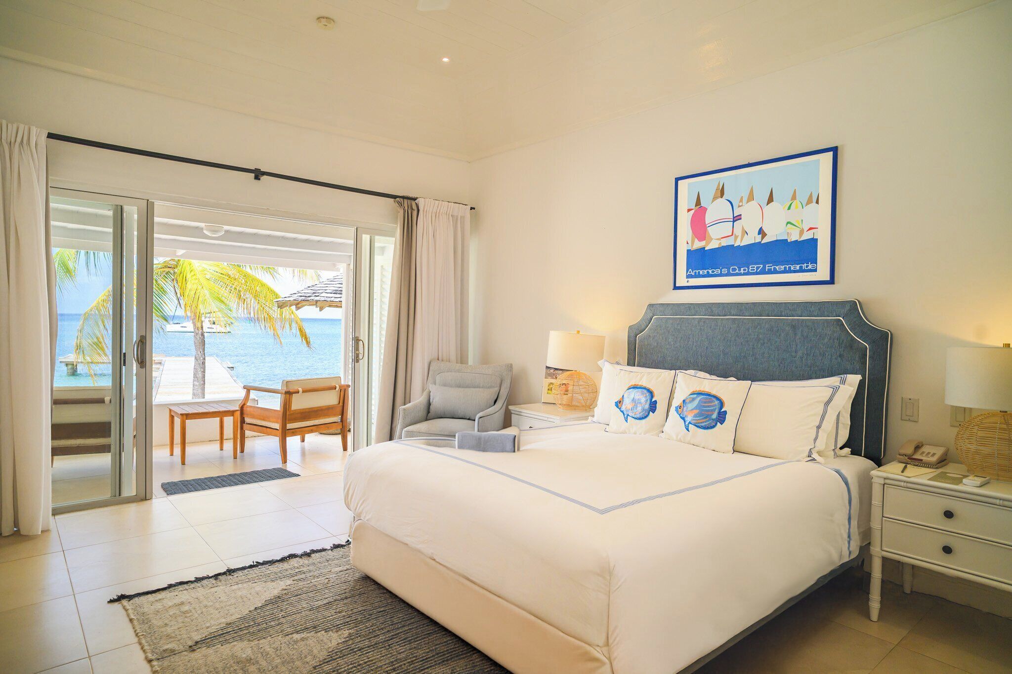 On the beach, white sand, sun loungers, beach umbrellas