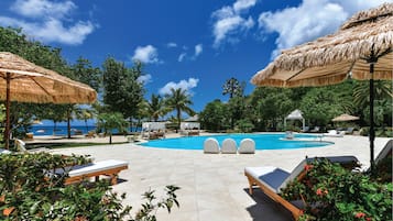 Outdoor pool, pool umbrellas, pool loungers