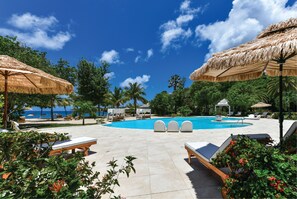 Outdoor pool, pool umbrellas, sun loungers