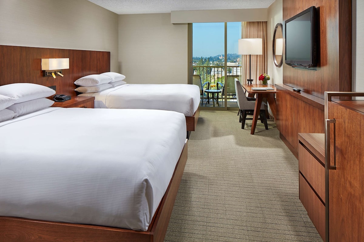 Premium bedding, down comforters, pillowtop beds, in-room safe