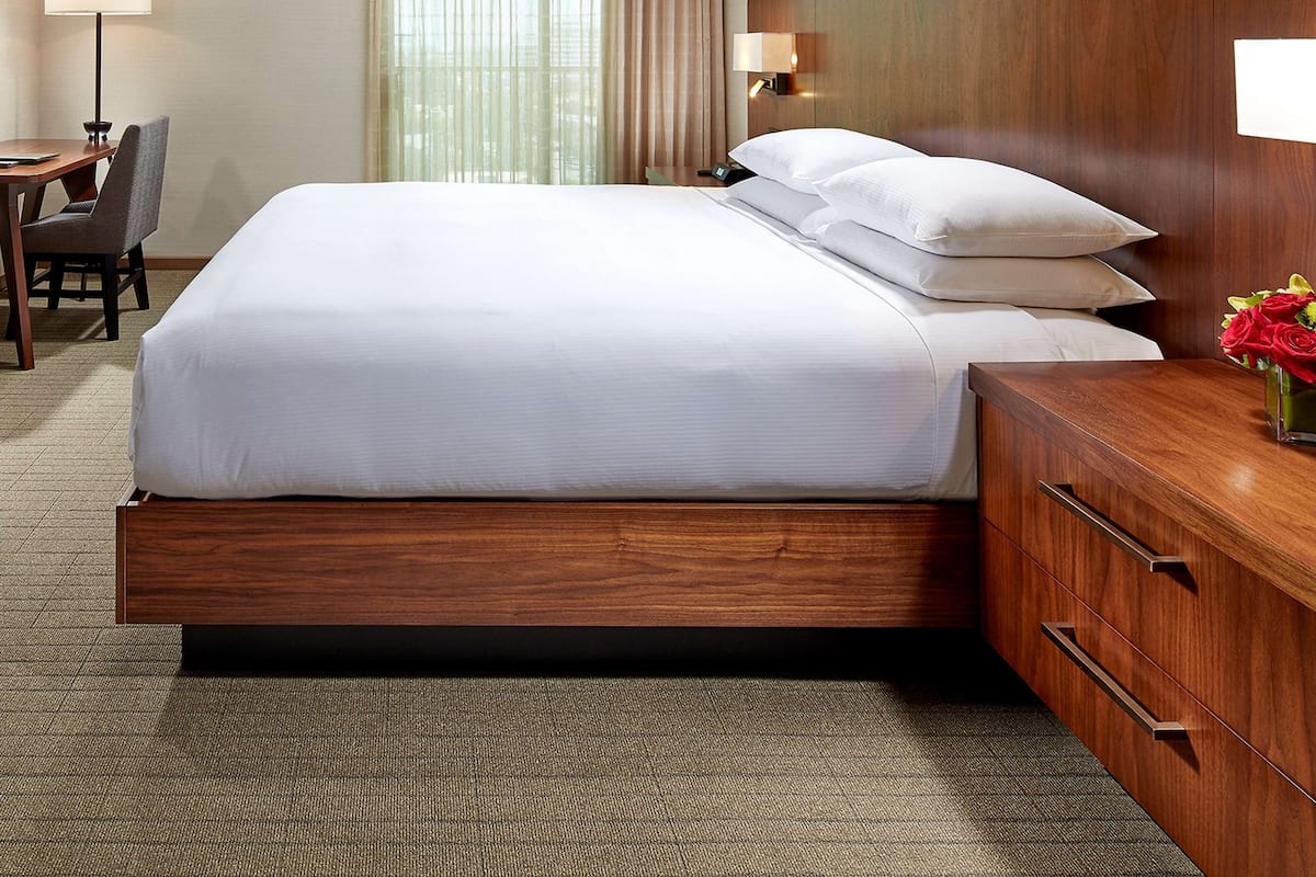 Premium bedding, down comforters, pillowtop beds, in-room safe