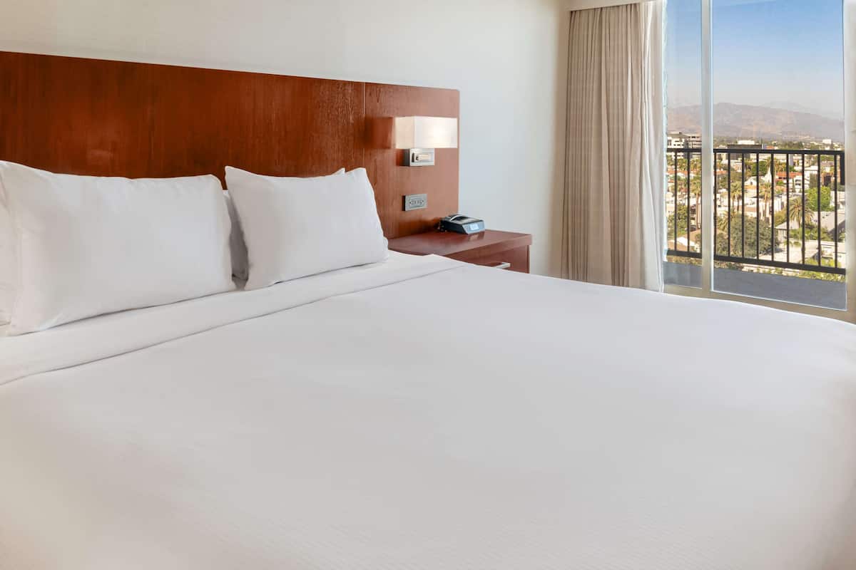 Premium bedding, down comforters, pillowtop beds, in-room safe