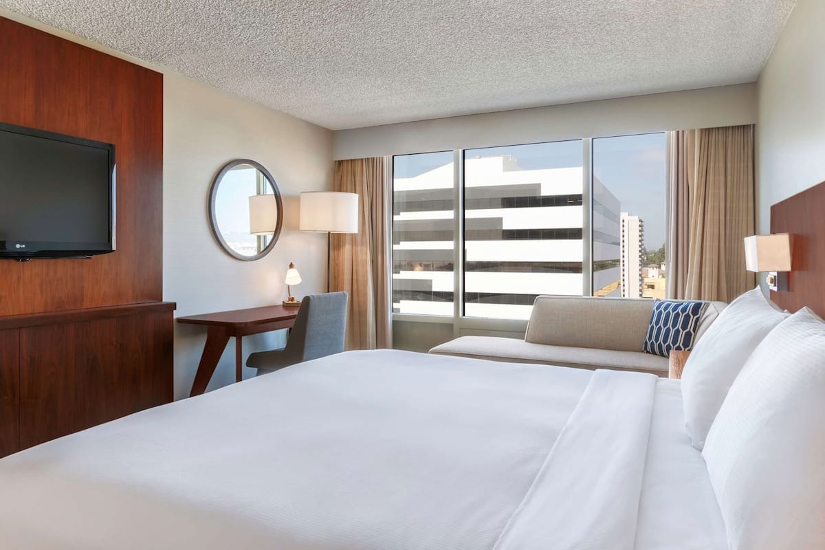 Premium bedding, down duvets, pillow-top beds, in-room safe