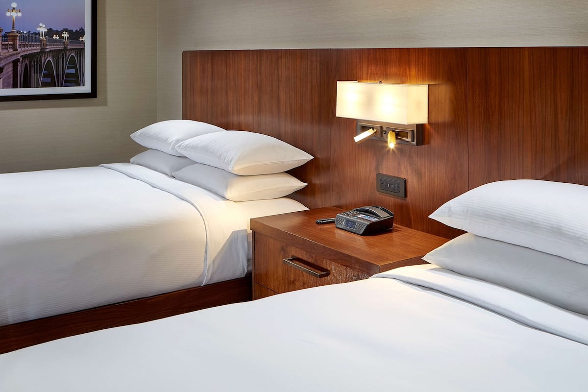 Premium bedding, down comforters, pillowtop beds, in-room safe