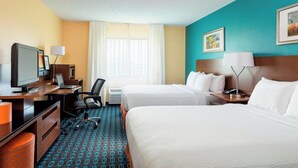 A hotel room with two beds, a desk with a computer, a television, and a lamp. - Fairfield Inn & Suites by Marriott Springfield (Springfield)