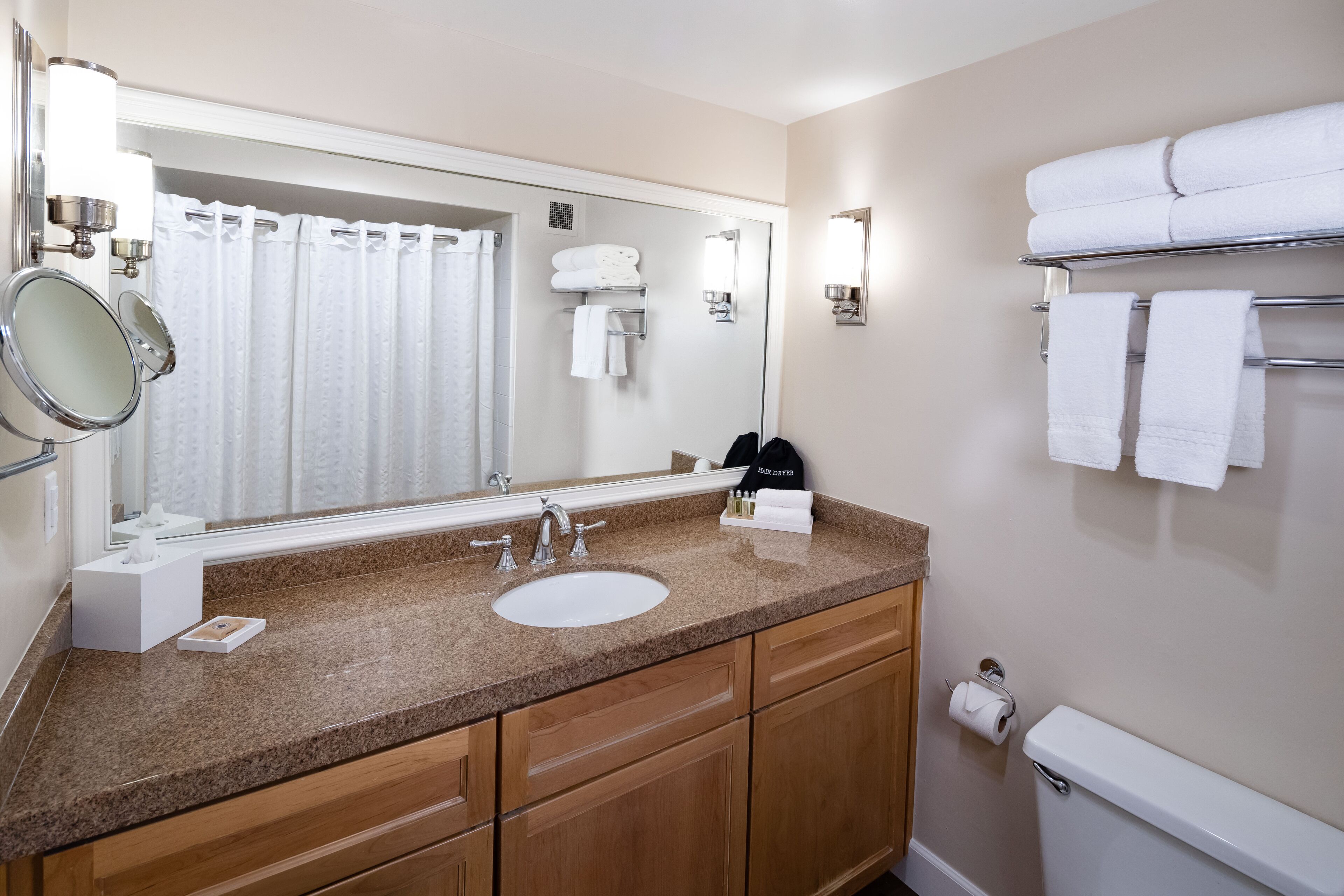 combined shower/bathtub, hair dryer, towels, soap