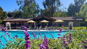 Outdoor pool, open 7 AM to 10:30 PM, pool umbrellas, sun loungers